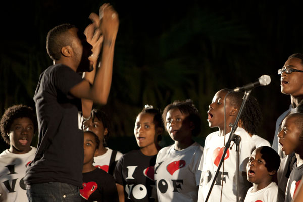 Choir director Gamaliel Fleurantin leads the Voices of Faith Choir from Hillside First Haitian Church of God in a performance for Gospel Explosion. This is the first time the Choir has performed on the University of Miami campus. Charlotte Cushing // Contributing Photographer