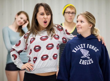 Sophomores Veronica O'Brien, as Frank, and Dani Cox, as Rocky, rehearse for Rocky Horror on Saturday Oct. 12th in the UC ballrooms while stage manager Megan Stephan and Diego Patrimonio as Riff Raff look on. Rocky Horror premieres on Thursday. Monica Herndon // Photo Editor