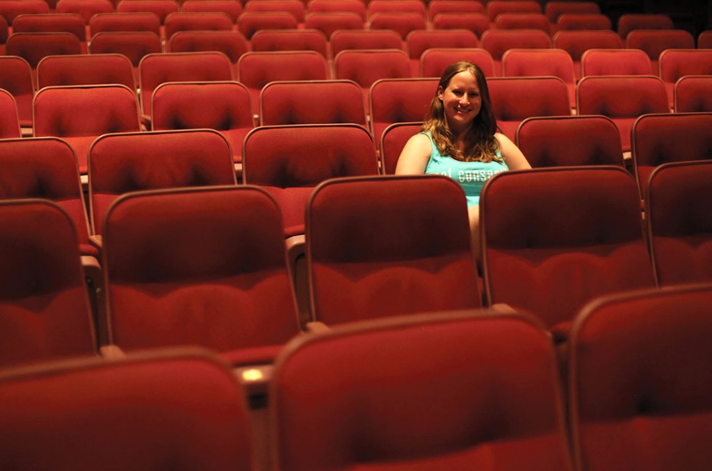Senior Stephanie Rey poses for a portrait in the Cosford Cinema on Wednesday afternoon. Monica Herndon // Photo Editor
