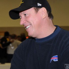 Football hall-of-famer Jim Kelly in December 2010. // Public domain photo by Staff Sgt. Corenthia Fennell