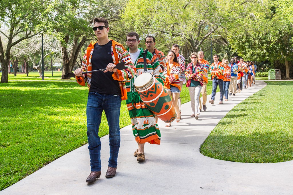 XXXX leads current and newly inducted members through campus Thursday to "tap in" other members of the UM community. Nick Gangemi // Photo Editor