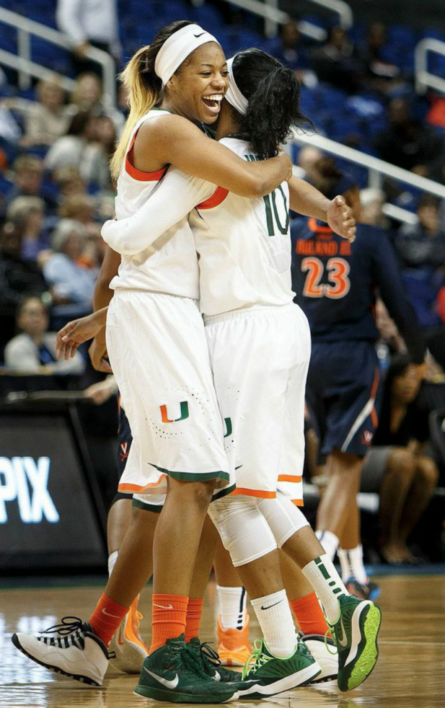 Michelle Woods and Erykah Davenport embrace after a Woods three late in the game. // Courtesy - The ACC 
