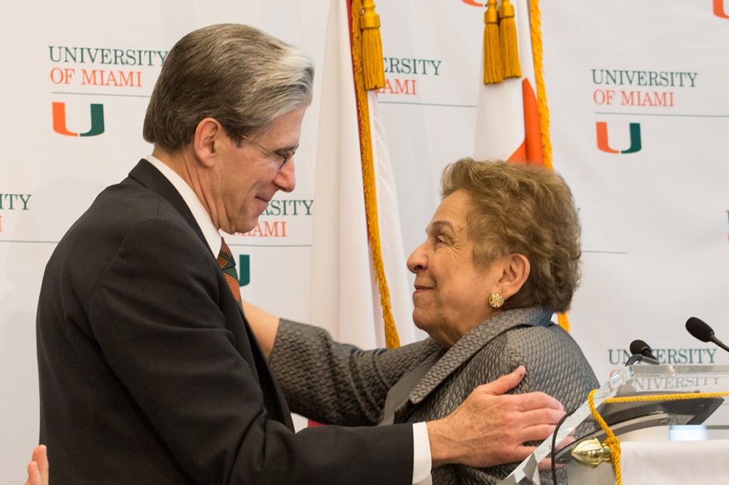 Sixth president Dr. Julio Frenk and current UM President Donna E. Shalala embrace each other at a press conference Monday. Erika Glass // Managing New Editor