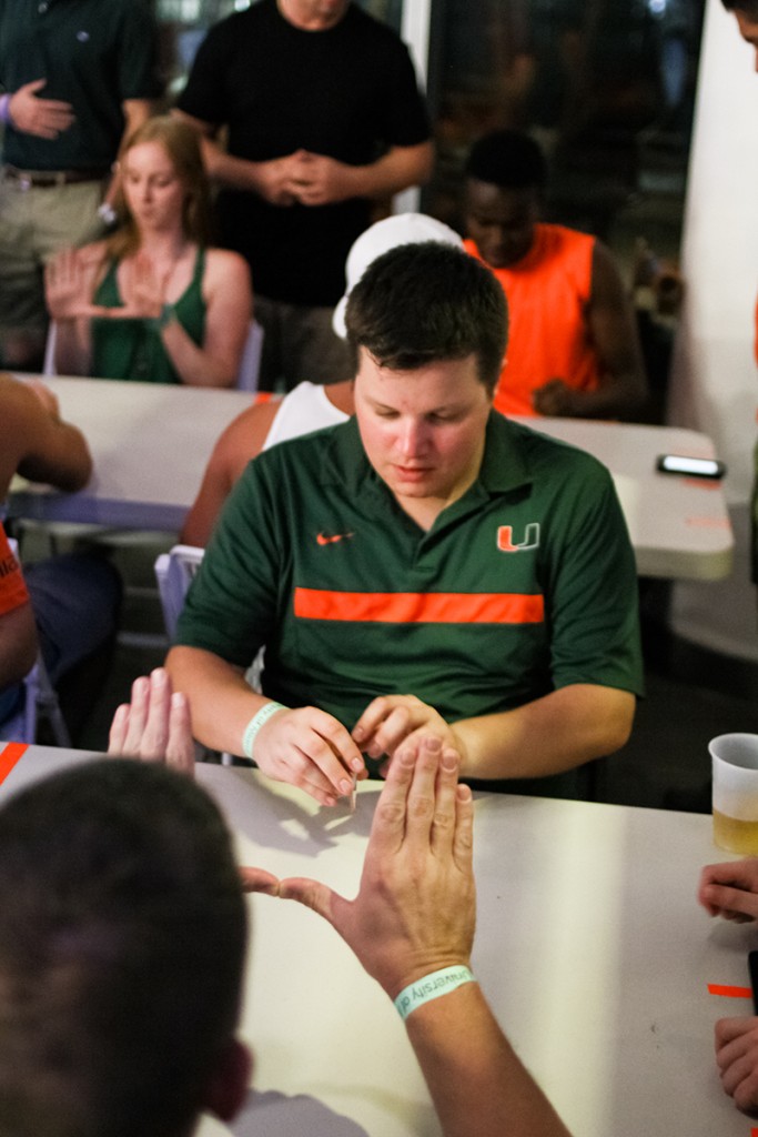 Alumni Mike Cody competes in the Flick Football Tournament during the Cincinnati Watch Party Thursday at the Rathskeller. Participating students had the chance to win tickets to the upcoming football game against FSU and a hotel stay in Tallahassee. Erum Kidwai // Contributing Photographer