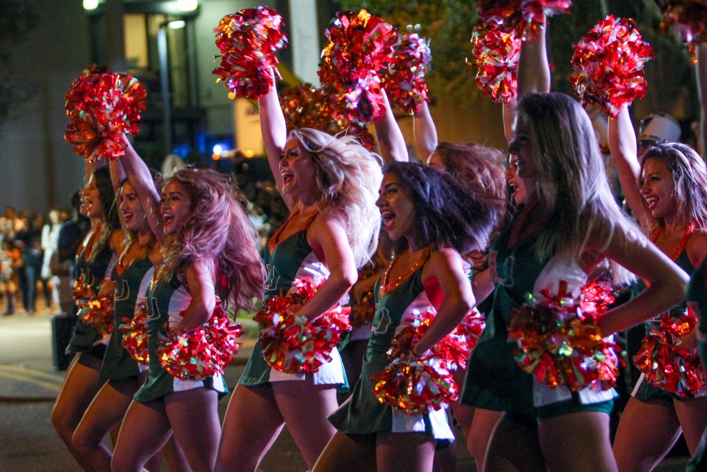 The UM Cheerleaders perform during the Homecoming Parade. Hallee Meltzer // Photo Editor
