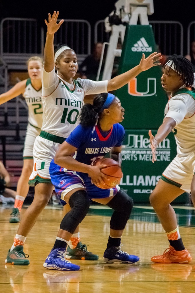Red shirt senior guard Michelle Woods (10) defends a River Hawk player during Sunday’s game against UMass Lowell in the BankUnited Center. The Canes won 84-53. Shreya Chidarala // Assistant Photo Editor