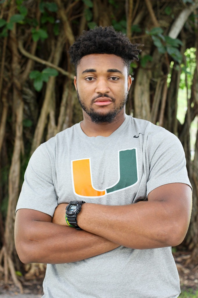 Redshirt freshman defensive lineman Demetrius Jackson spends his time off the field volunteering with the kids of the Miami community. Jackson is preparing to present at a conference hosted by Booker T. Washington High School in February. Erum Kidwai // Assistant Photo Editor