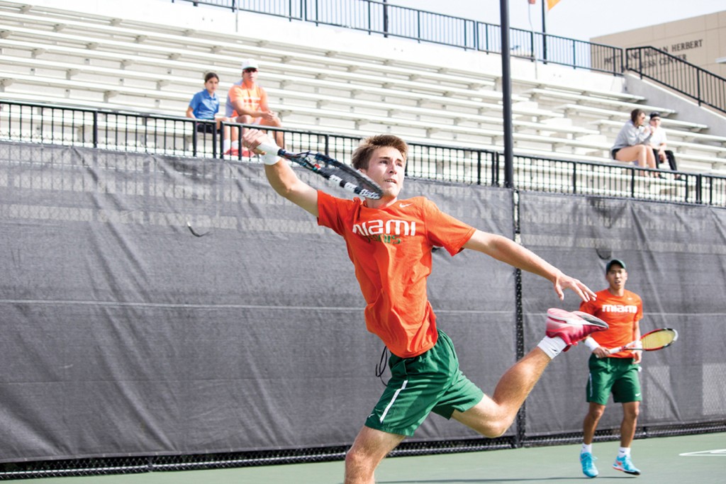 Sophomore Piotr Lomacki competes in last season's match against Liberty. Lomacki is currently ranked No. 23 in the country for men's tennis and is pursuing a professional career. Giancarlo Falconi // Staff Photographer