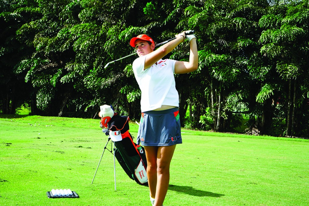 Freshman Dewi Weber practices her swing at the Biltmore Golf Club. Weber finished a season-best 5th in the UCF Challenge in Orlando this past Tuesday. Photo Courtesy Thomas Symonds