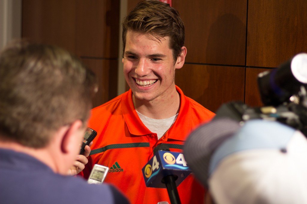 Freshman Jack Allison talks to reporters at the National Signing Day event at the Schwartz Center Wednesday afternoon. Allison is a Palmetto native and plays quarterback. Kawan Amelung // Staff Photographe
