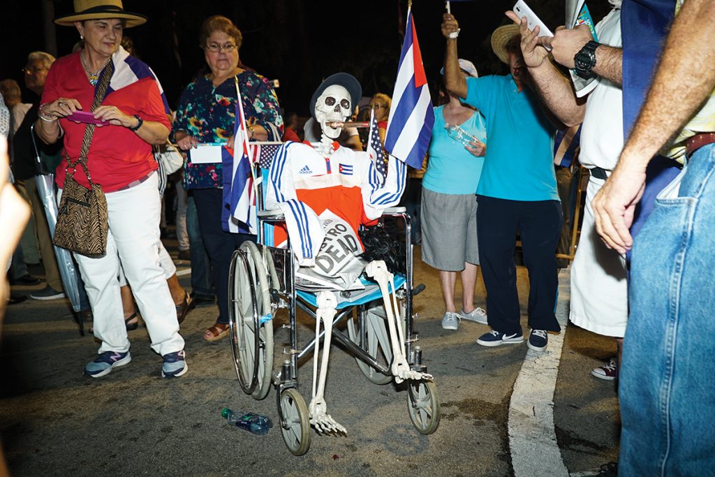 A prop skeleton is dressed to represent the late Fidel Castro during the rally that took place at the Bay of Pigs memorial Wednesday in Little Havana. Hunter Crenian // Staff Photographer
