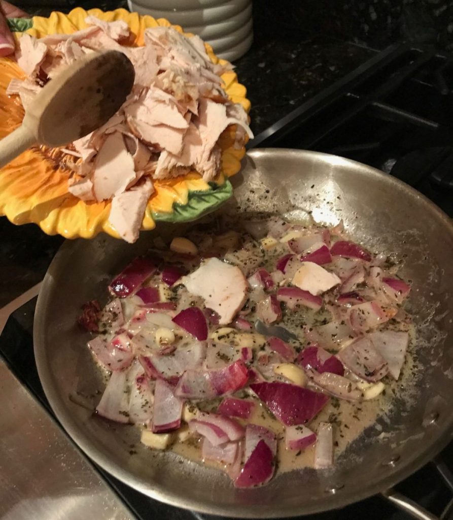 Add fresh chicken to your sautéed onions