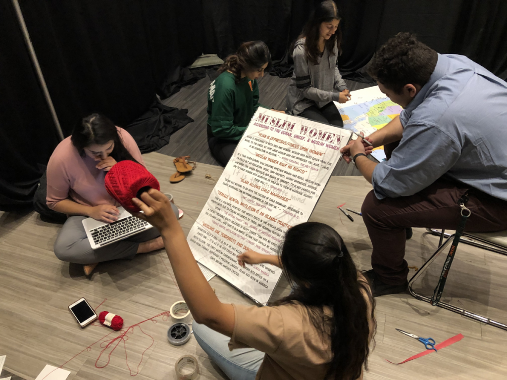 Students begin work on the Tunnel of Oppression, which will take place Jan. 22-24 in the Shalala Student Center Ballrooms. Photo credit: Reese Pitts
