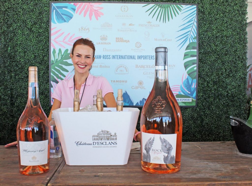 A representative from Shaw-Ross International Importers– leading importer of wine and spirits– offers samples of various Rosé wines at the 2020 South Beach Wine & Food Festival’s Goya Grand Tasting Village.
