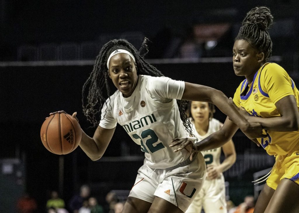 Senior Beatrice Mompremier drives the ball to the basket in Miami's win over Pitt on Sunday, March 1. Mompremier finished the game with 13 points and secured her 1,000th rebound as a Miami Hurricane.