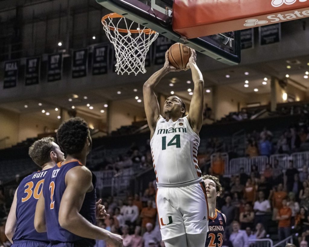 Redshirt junior center Rodney Miller attempts a dunk in Miami�a 46-44 loss to Virginia Wednesday, March 4. Miller had six points and grabbed 4 rebounds in the game.