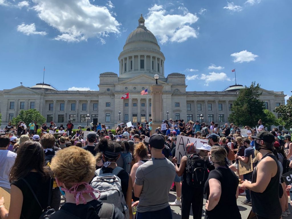 Protestors gather during a demonstration outside of the Arkansas State Capitol in Little Rock, AR on Sunday, June 7, 2020.