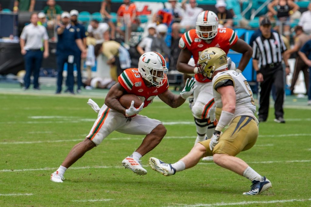 Then-Sophomore Running Back Cam'Ron Harris attempts to juke a defender during Miami's game versus Georgia Tech at Hard Rock Stadium on Oct. 19, 2019.