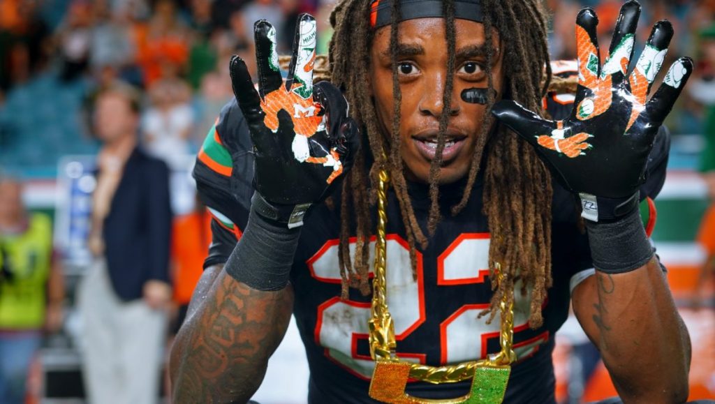 Former ‘Cane, and current Cleveland Browns safety, Sheldrick Redwine throws up the 305 with while wearing the turnover chain during Miami’s Homecoming game versus Virgnia Tech at Hard Rock Stadium on Nov. 4, 2017. Redwine had his first NFL interception on Tuesday night during the Browns game versus the Indianapolis Colts.