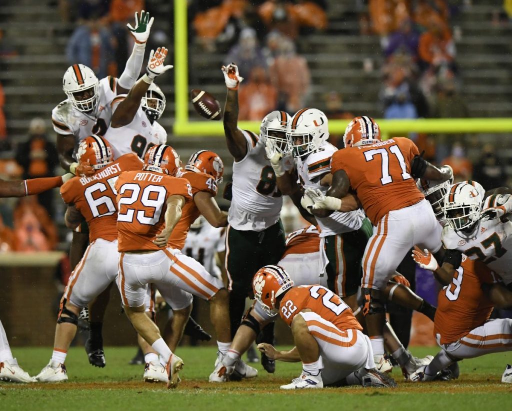 Miami blocks a 61-yard field goal attempt by Clemson kicker B.T. Potter (29) during Miami's game against Clemson at Memorial Stadium in Clemson, SC on Saturday, Oct. 10, 2020.