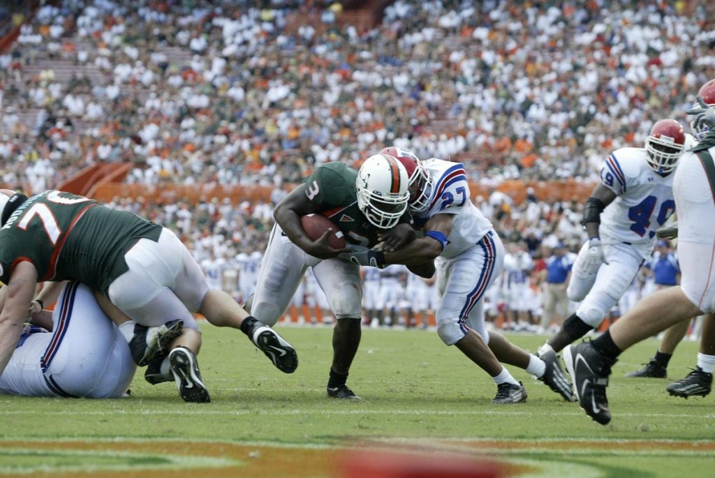 Running Back Frank Gore powers forward during Miami's game versus Louisiana Tech at the Miami Orange Bowl on Sept. 18, 2004.
