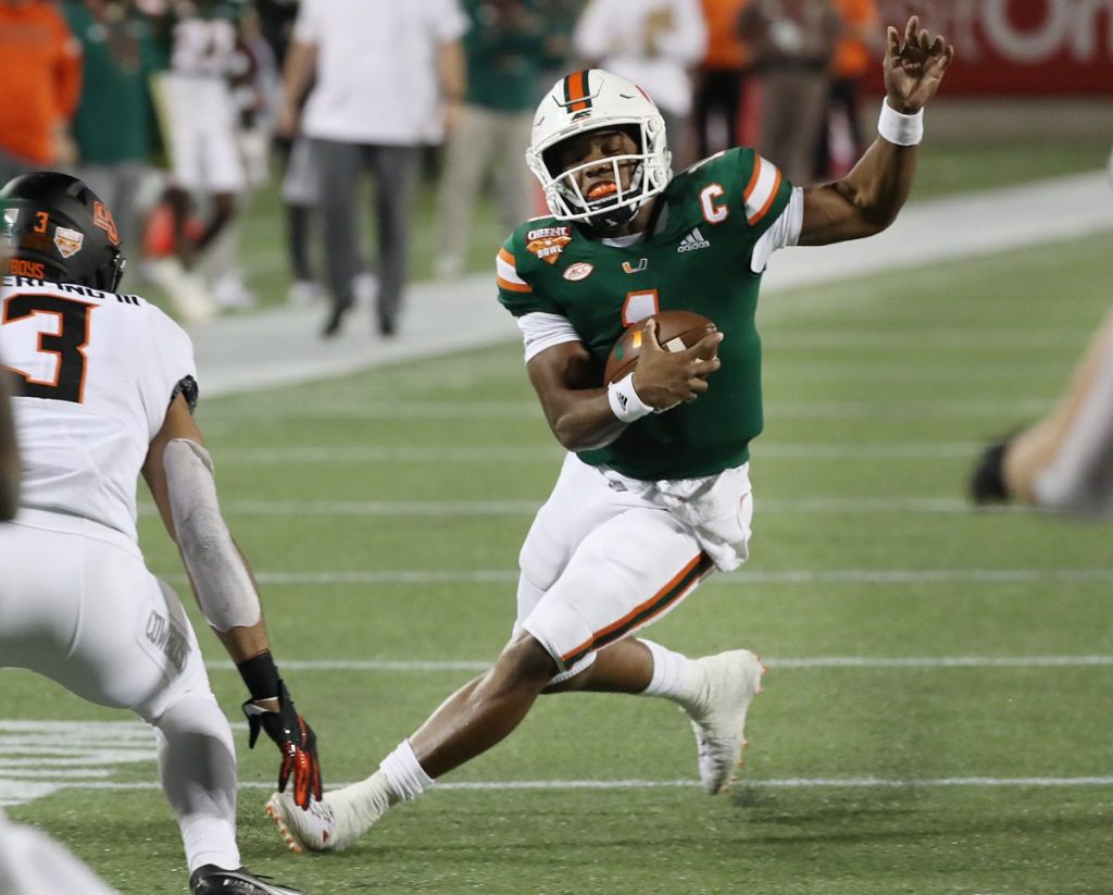 Miami quarterback D’Eriq King (1) scrambles during the Cheez-It Bowl college football game of Miami versus Oklahoma State at Camping World Stadium in Orlando on Tuesday, December 29, 2020.