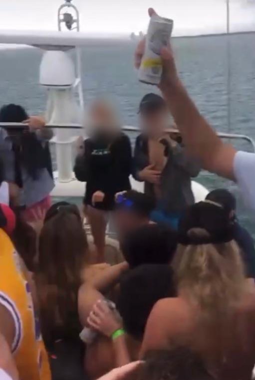 Members of Zeta Tau Alpha and Sigma Phi Epsilon gather on boat on Feb. 6. Screenshot was taken from a live Instagram post.