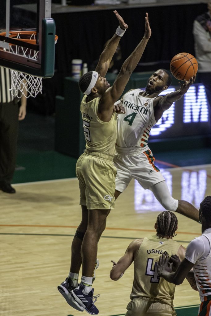 Senior Elijah Olaniyi goes up for a contested layup in the second half of Miami's loss to Georgia Tech on Saturday Feb. 20. Olaniyi led Miami with 18 points.