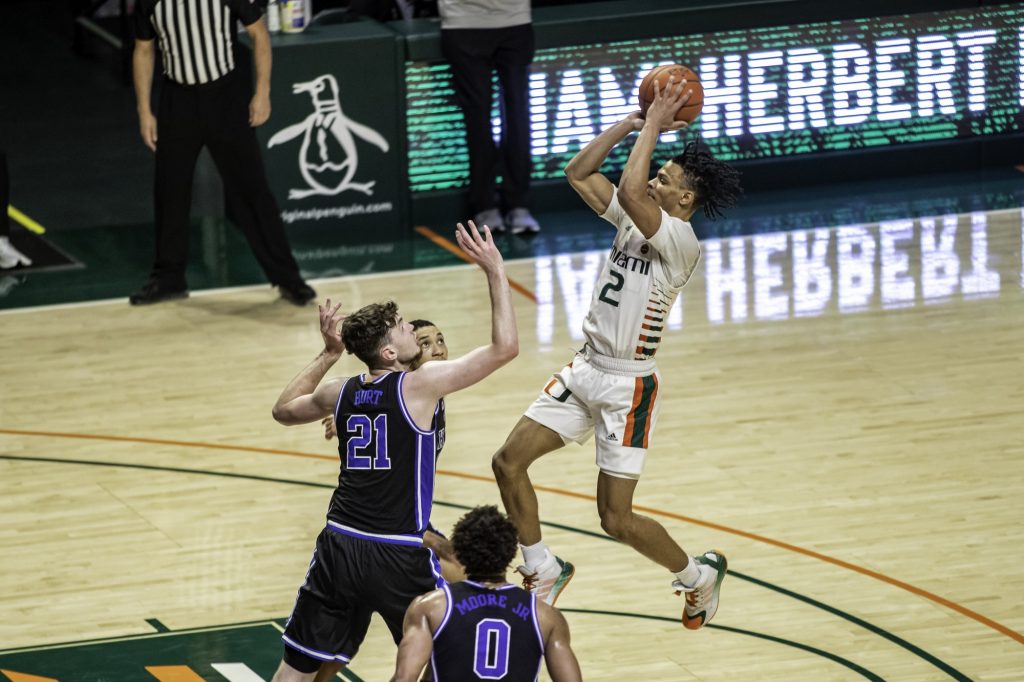 Sophomore Isaiah Wong takes a shot from near the free throw line in Miami's win over Duke on Monday Feb. 1 at the Watsco Center. Wong averaged 17.1 points per game and was named all ACC third team.