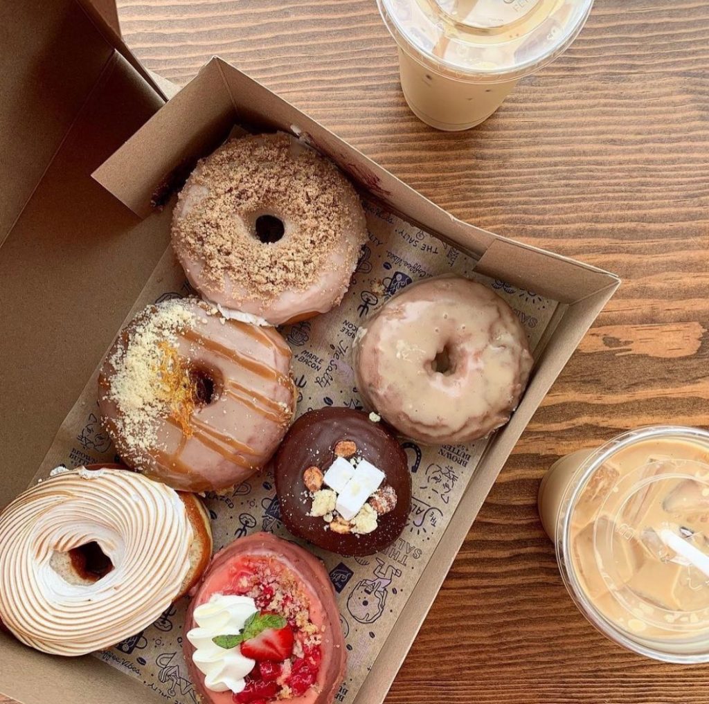 The Salty Donut is known for its artisan-style donuts and popular collaborations like the Knaus Berry Farm cinnamon roll donut.