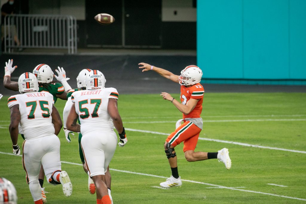 Jake Garcia, a true freshman who enrolled early in January, throws a pass during Miami's second scrimmage of the spring season.