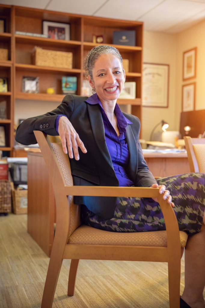 Laura Kohn-Wood, dean of the School of Education and Human Development, in her office at UM. Kohn-Wood considered pursuing a career in boxing before pursuing academia.