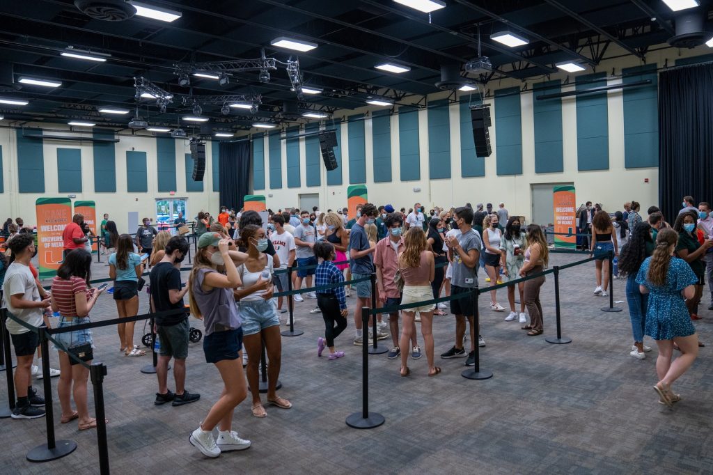 Incoming freshman wait in line to have their Cane ID photos taken in the Watsco Center during ‘Cane Kickoff on Aug. 17, 2021.