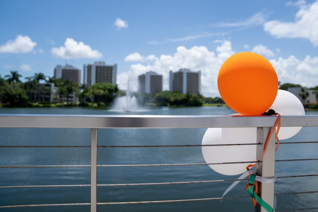 Decorative balloons adorn Fate Bridge, welcoming incoming Freshman and family members during ‘Cane Kickoff 2021, on Aug. 17, 2021.