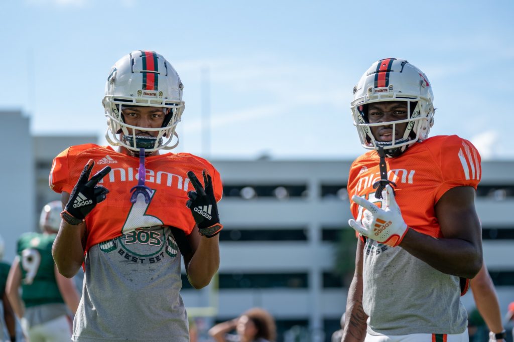 Junior wide receiver Mark Pope and freshman wide receiver Brashard Smith pose during practice at the Greentree Practice Fields on Sept. 14, 2021.
