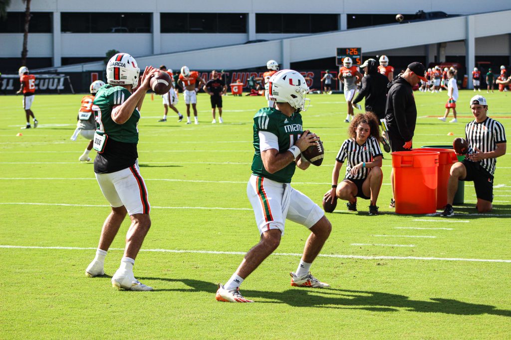 Freshman quarterback Jake Garcia and redshirt sophomore quarterback Ryan Rizk throw passes during practice on Sept. 14, 2021.