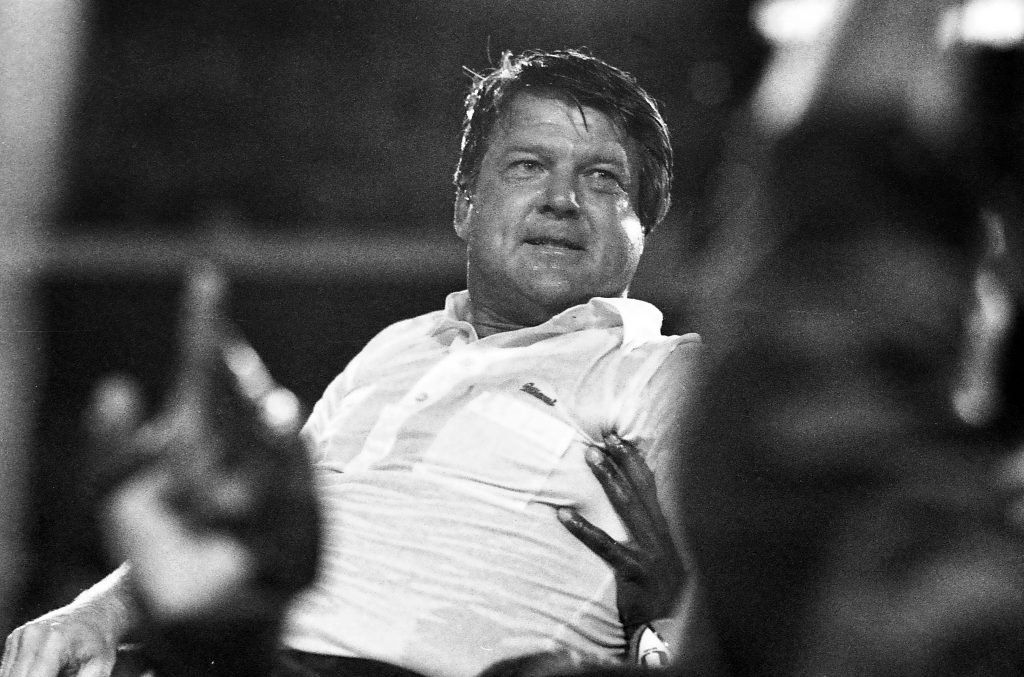 University of Miami Hurricanes head coach Jimmy Johnson is carried off the field after defeating the Oklahoma Sooners 20-14 for the national title January 1, 1988.