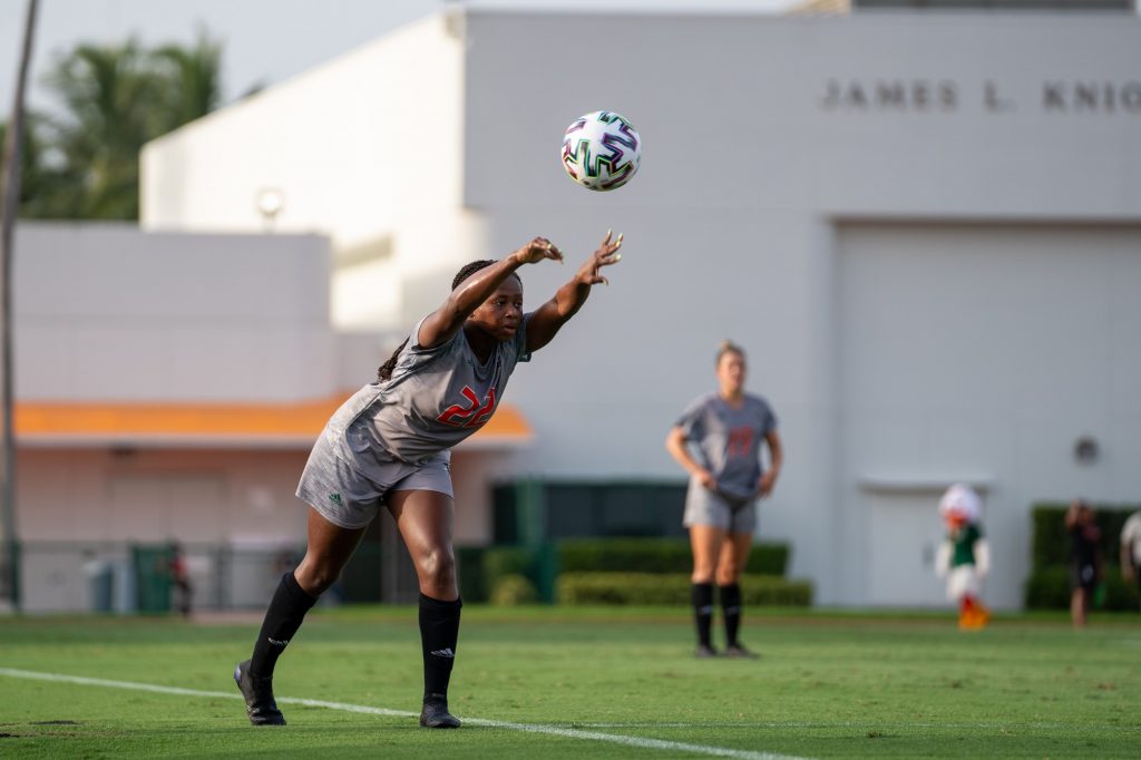 Junior midfielder/defender Taylor Shell throws the ball in during the Canes’ match versus FAU at Cobb Stadium on Aug. 22, 2021.