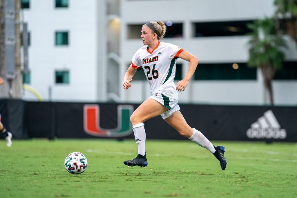 Junior defender Emma Tucker dribbles downfield during the second half of Miami’s match versus Notre Dame at Cobb Stadium on Sept. 23, 2021.