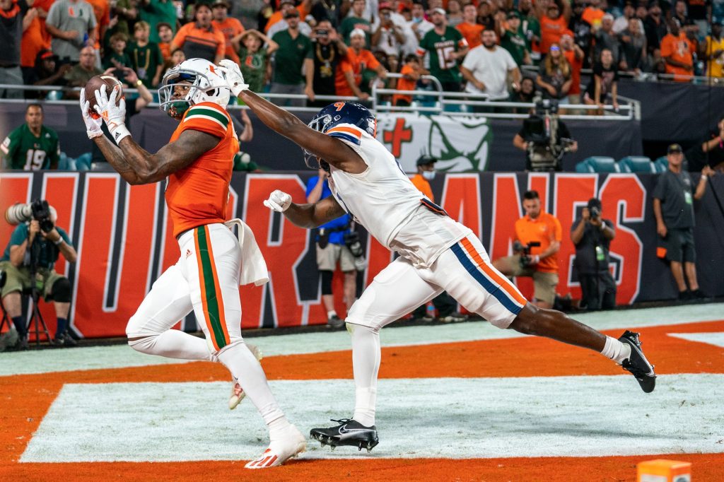 Senior wide receiver Mike Harley catches a pass for a touchdown during the third quarter of Miami’s game versus the University of Virginia at Hard Rock Stadium on Sept. 30, 2021. Harley had six receptions for 45 yards, and one touchdown.