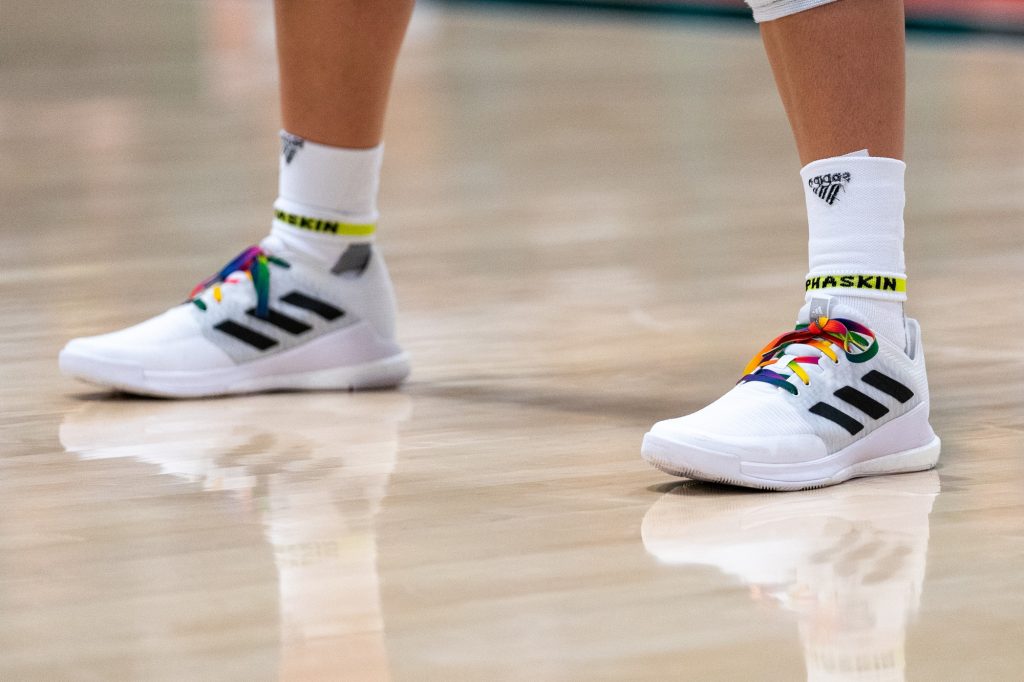 Some Miami volleyball players laced up their shoes with pride-themed laces, in honor of their pride night match versus the University of North Carolina in the Knight Sports Complex on Oct. 1, 2021.