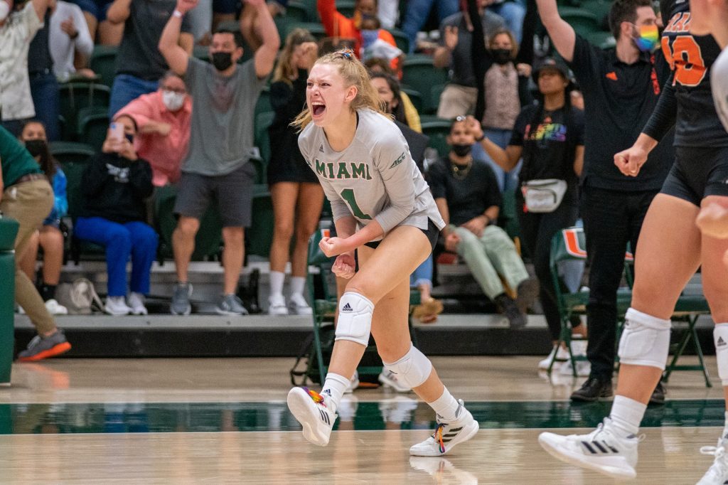 Junior setter Savannah Vach celebrates after Miami won the final set, and their match versus the University of North Carolina in the Knight Sports Complex on Oct. 1, 2021.