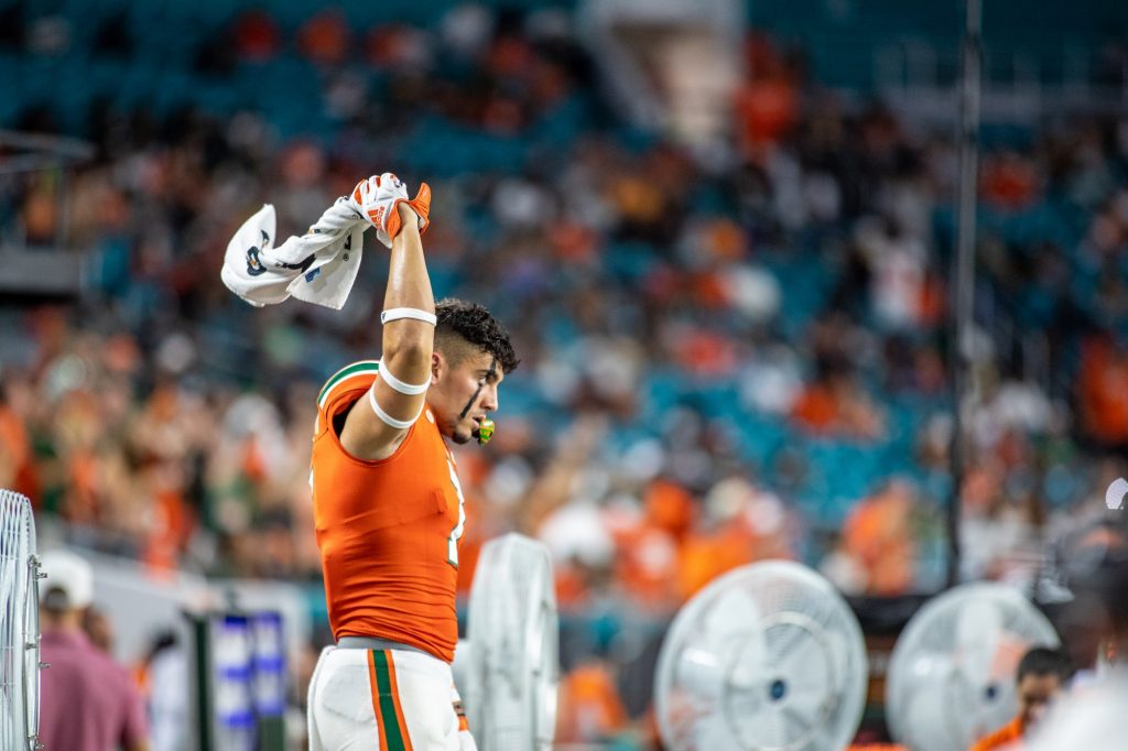 Freshman wide receiver Xavier Restrepo waves his towel around right before kickoff against Virginia on Thursday Sept. 30 at Hard Rock Stadium.