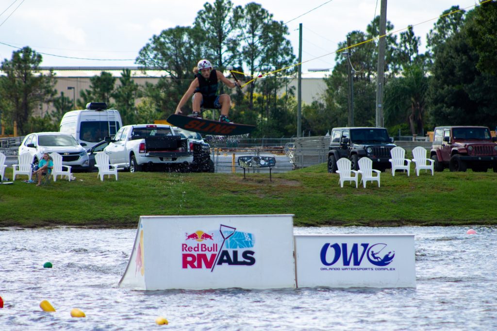 Senior president Tyler Gallant completing a 360-degree frontside nose grab during a practice session at Orlando Watersports Complex. Gallant later competed in the most competitive heats for each competition against four other universities at the Redbull-sponsored event.