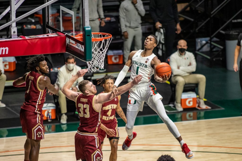 Sophomore Anthony Walker attempts a layup in Miami's win over Boston College on March 5, 2021 at the Watsco Center in Coral Gables.