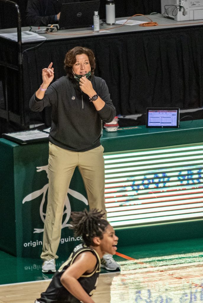 Head coach Katie Meyer yells at players as they move up the court in Miami's win over Wake Forest on Feb. 25 2021 at the Watsco Center in Coral Gables.
