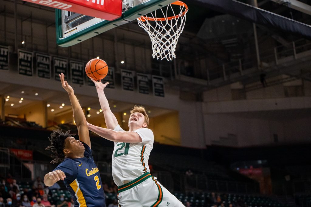 Sixth-year redshirt senior Sam Waardenburg fights for a layup in Miami’s win over Canisius on Tuesday, Nov. 9 at the Watsco Center. Waardenburg has been an integral member of the team his whole collegiate career.