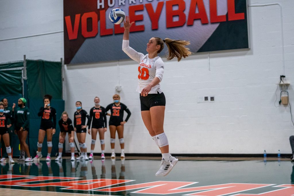 Senior libero Priscilla Hernandez serves during the first set of Miami’s match versus Boston College in the Knight Sports Complex on Oct. 31, 2021.