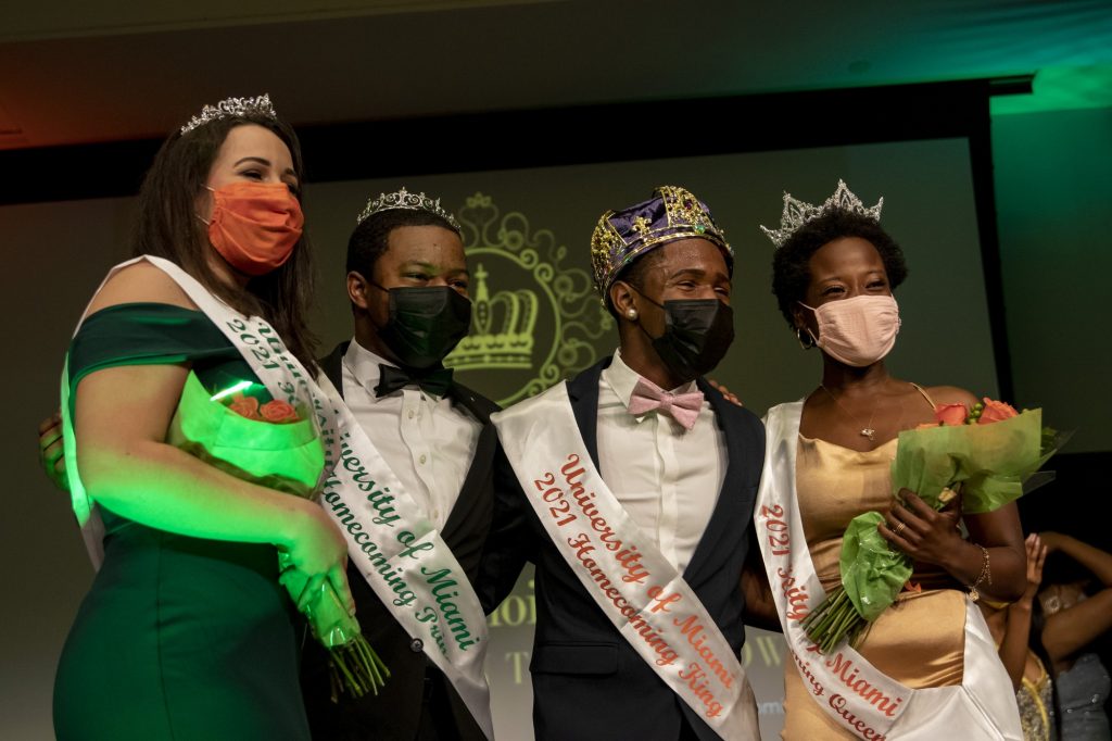 The 2021 Homecoming Court pose for a picture at the Shalala Student Center on Monday, Nov. 1. Seniors Ari Mubanda (right) and Corey Jones (center) were crowned king and queen, while senior Christine Sanchez (left) and sophomore Paul Douillon were named princess and prince.