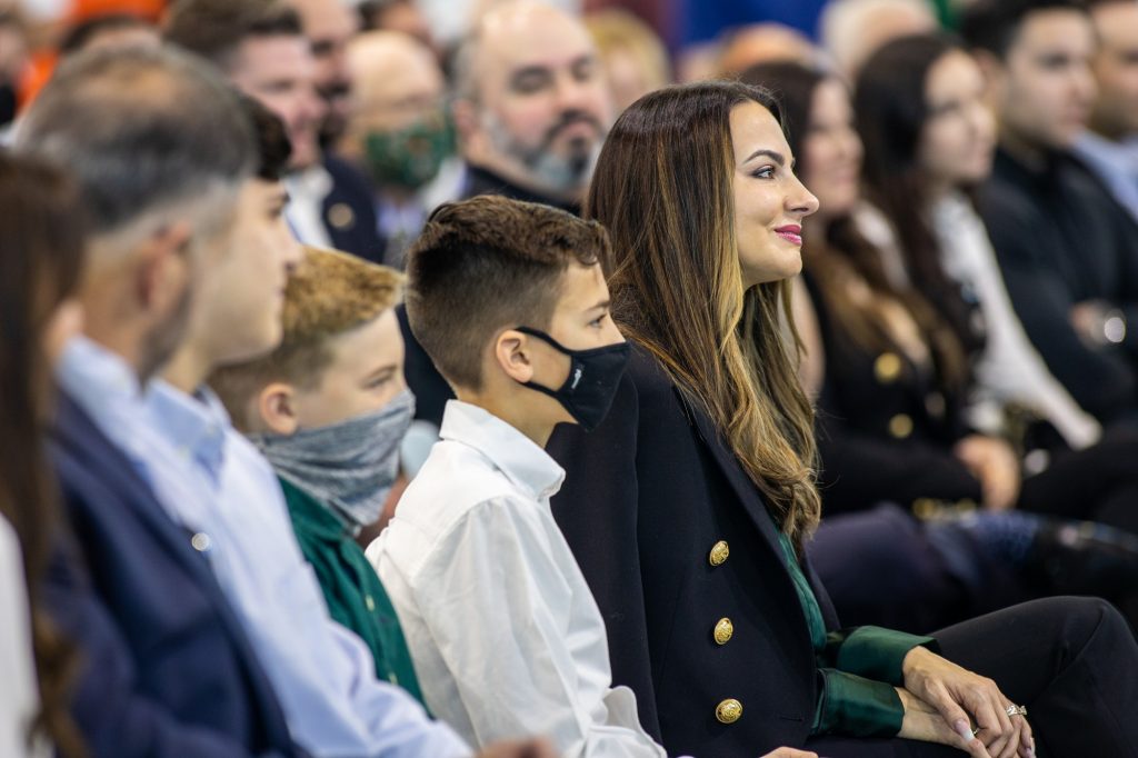 Jessica Cristobal and her sons Mario Mateo and Rocco look on as Mario Cristobal speaks about his family during his introductory press conference at the Carol Soffer Indoor Practice Facility on Tuesday Dec. 7.